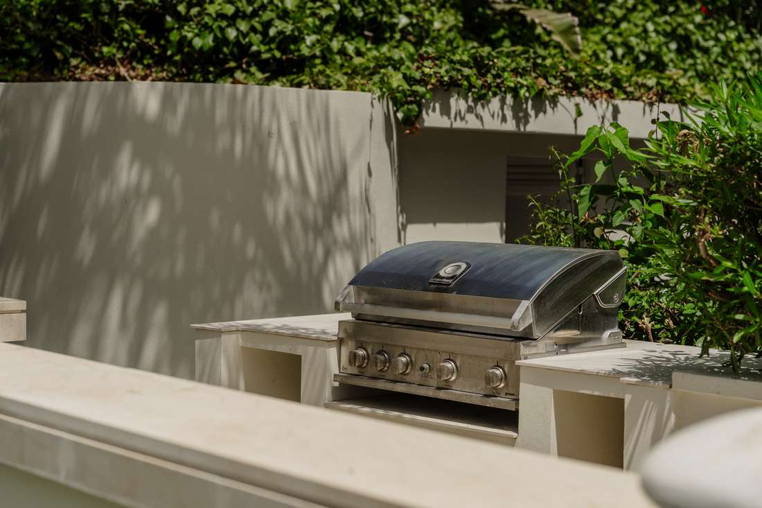 Cocina exterior con barbacoa